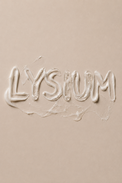 The word 'LYSIUM' written in a cream-colored substance on a beige background